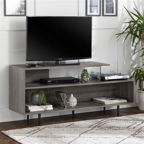 Walmart stands - Apr 18, 2023 · Bellamy Studios Desert Fields Anais Asymmetrical TV Stand. Walmart. $ 197.50. was $ 284.00. Break up any bland space with a two-toned furnishing such as this compact TV stand. Black and dark brown shouldn't look so sleek together, but the Anais cabinet clearly proves otherwise. 